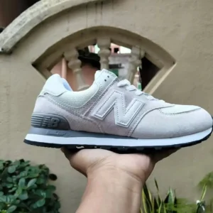 New Balance retro-style light gray running shoes