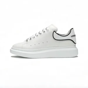 The simple style of McQueen's white sneakers
