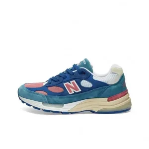 New Balance retro-style blue and pink sports shoes