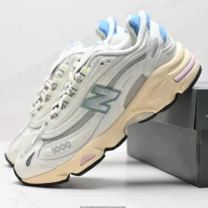 New Balance 1000 series retro-style white shoes