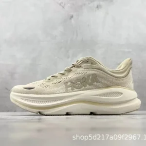 Retro-style beige HOKA sneakers