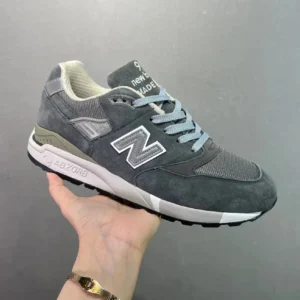 Retro-style grey sports shoes of New Balance