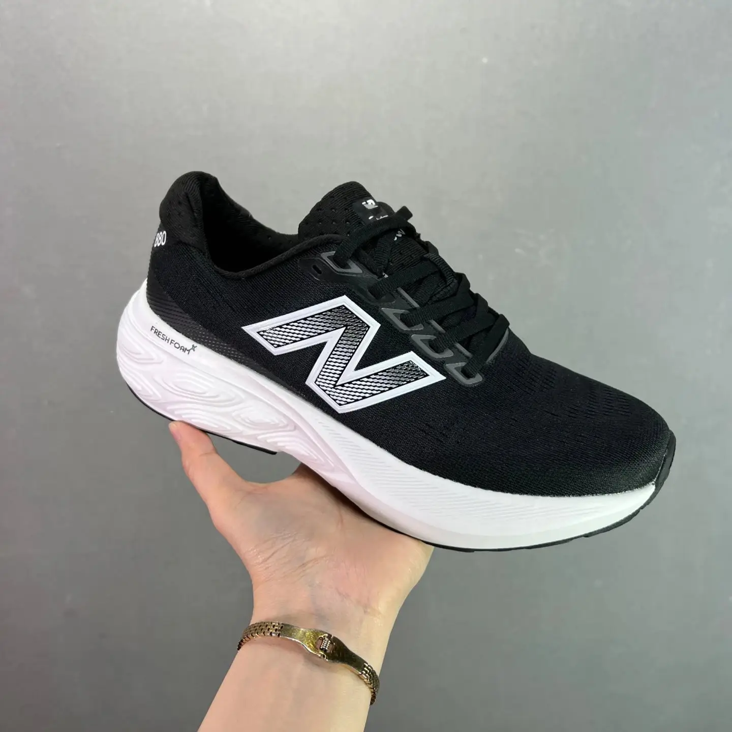 New Balance Fresh Foam X black and white sports shoes