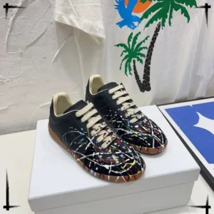 Maison Margiela graffiti-style black shoes