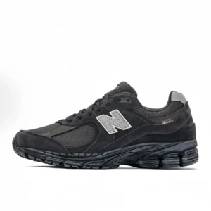 New Balance 2002R retro-style black and gray sports shoes