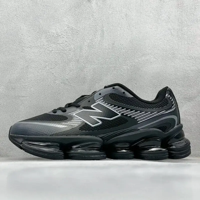 New Balance retro-style black and gray sports shoes