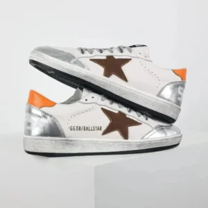 Golden Goose Ball Star retro-style white and orange shoes