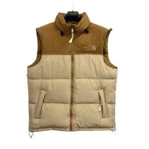 The North Face patchwork style brown-yellow vest