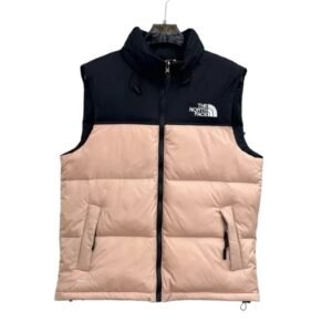 The North Face patchwork style pink and black vest